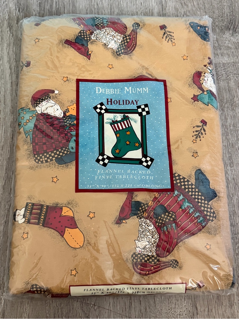 Debbie Mumm Holiday Santa Flannel-Backed Vinyl Tablecloth 52 x 90 oblong
